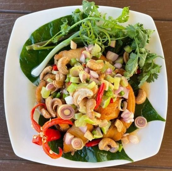 Fried Tilapia with Spicy Herb Salad and Betel Leaves